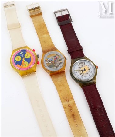 SWATCH Trois montres Lot de trois montres Swatch. Avec boîtes. (En l'état)....