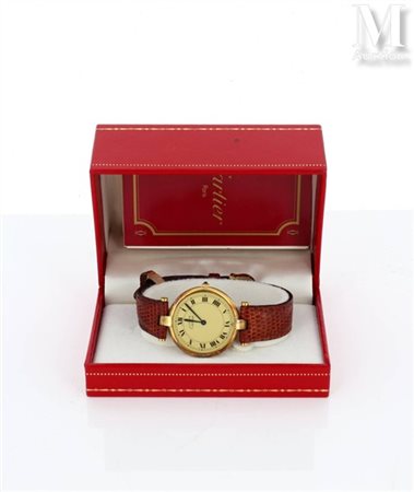 Must de CARTIER Montre bracelet en vermeil. Cadran fond crème, index chiffres...