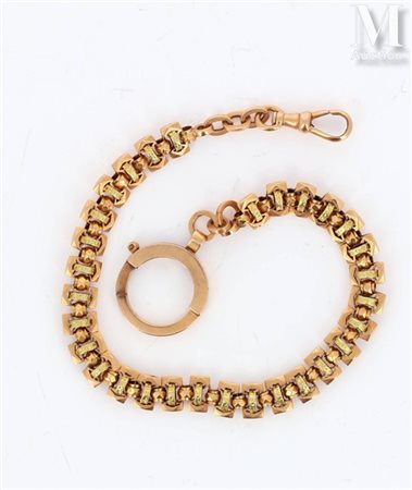 Chaine de montre Chaine de montre en or 18k (750 millièmes) formée de beaux...