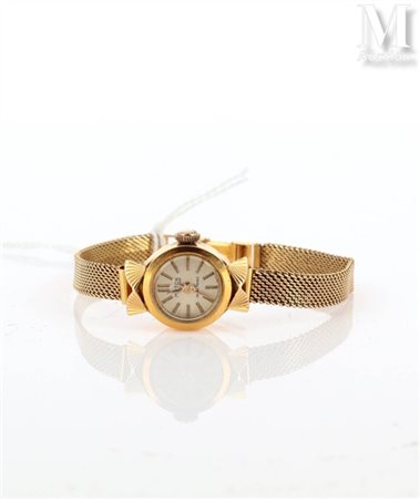 Montre Montre de dame en or jaune 18k (750 millièmes), cadran fond crème...