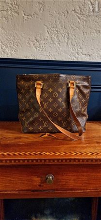 LOUIS VUITTON sac cabas "Piano" en toile monogrammée et cuir gold. Double...