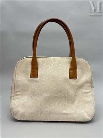 CÉLINE Sac Sac en toile monogrammée surpiquée écrue et cuir gold. Fermeture...