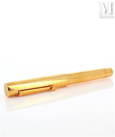 OMAS Stylo plume, corps en or jaune 18k (750 millièmes) et résine. Modèle...