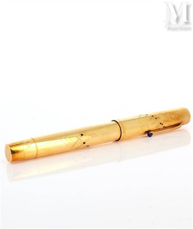 OMAS Stylo plume, corps en or jaune 18k (750 millièmes) et résine. Numéroté...