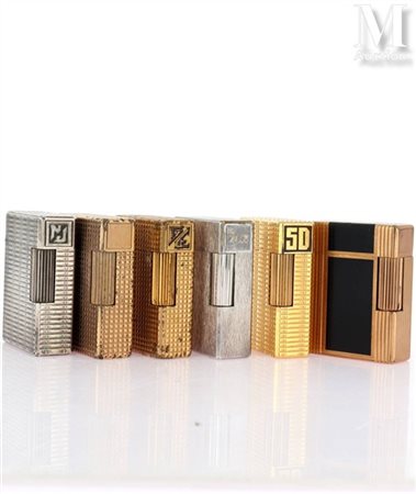S.T. DUPONT Ensemble de 6 briquets DUPONT en métal doré ou argenté, à décor...