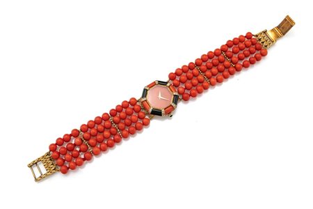Delaneau - Orologio gioiello in oro, corallo, onice e brillanti Lunghezza cm...