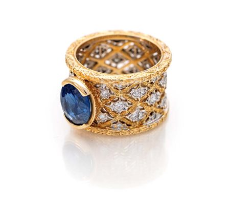 Mario Buccellati, anello veretta in oro, brillanti e zaffiro centrale Misura...