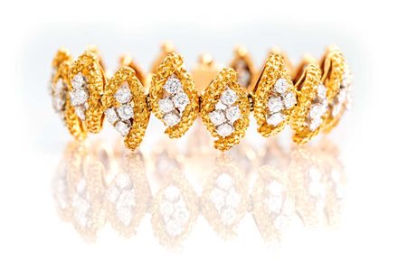 Boucheron, importante bracciale in oro e brillanti Lunghezza cm 19,50 Anni...