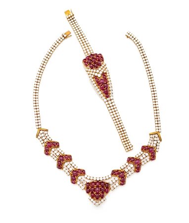Importante parure di pettorale e bracciale in oro, brillanti e rubini Burma...