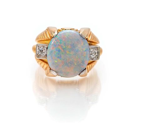 Anello da uomo in oro, opale e brillanti Misura 25 Oro giallo 750/000. Peso...