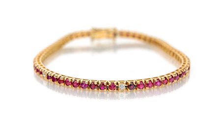 Bracciale tennis in oro, rubini e brillanti Lunghezza cm 18 Oro rosa 750/000....