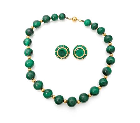 Parure in oro e malachite Lunghezza collana cm 49. Diametro orecchini cm 2,5....