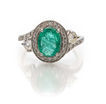 Anello in oro, brillanti e smeraldo Misura 15 Oro bianco 750/000. Smeraldo...