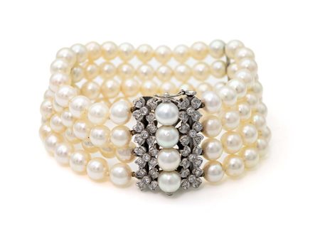 Bracciale in oro, perle e brillanti Lunghezza cm 17,5 Oro bianco 750/000....