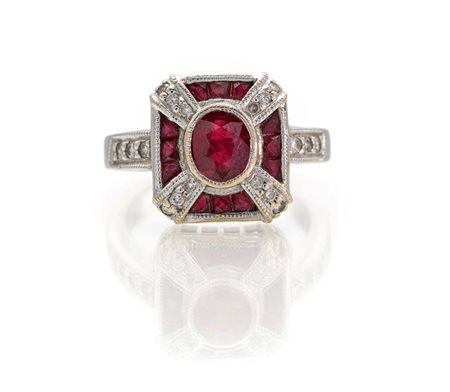 Anello in oro, rubini e brillanti Misura 12 Oro bianco 750/000. Peso...