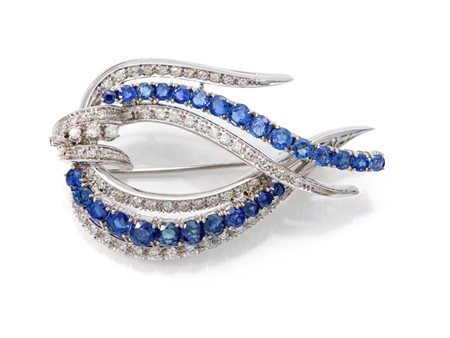 Spilla a goccia oro, zaffiri e brillanti Lunghezza cm 5 Oro bianco 750/000....