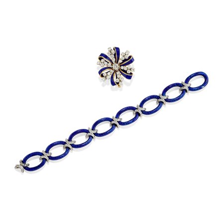 Spilla e bracciale con smalto