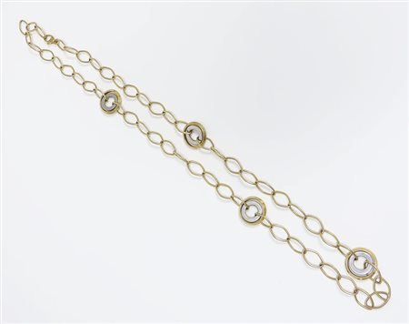 COLLANA IN ORO realizzata come una catena con maglie ovoidali intervallate da...