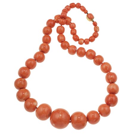 Collana con grandi boules scalari in corallo aranciato fermezza in oro giallo...