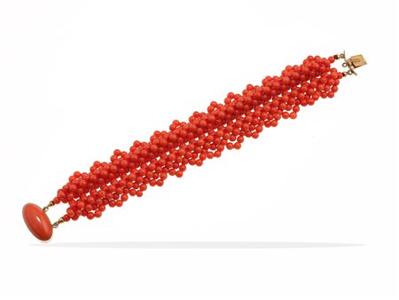 Bracciale con piccole boules di corallo fermezza in oro giallo 750/1000, gr....