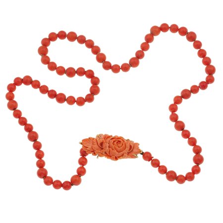 Collana in corallo fermezza in oro giallo ed oro bianco 750/1000, con corallo...