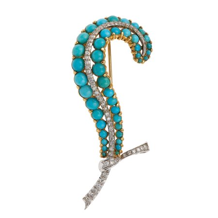 Spilla con turchesi e diamanti montatura in oro giallo ed oro bianco...