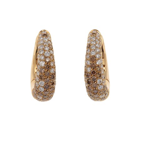 Orecchini con pavè di diamanti bianchi e brown per totale ct 5.00 circa...