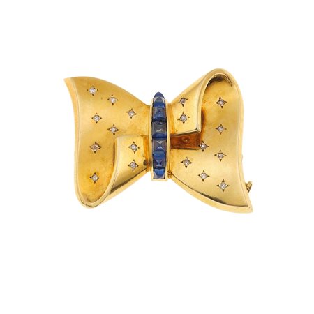 Tiffany & Co. Spilla 'fiocco' con zaffiri e diamanti montatura in oro giallo...