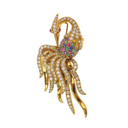 Spilla “fenice” con diamanti, rubini, smeraldi e zaffiri montatura in oro...