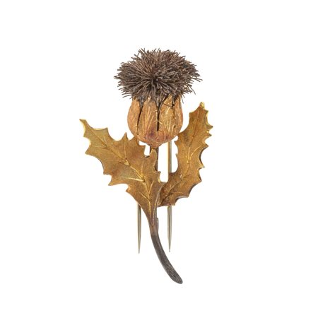 M. Buccellati. Spilla 'Cardo' montatura in oro giallo 750/1000 e argento....