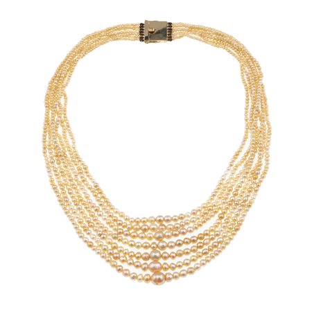 Collana a sette fili di perle naturali, acqua salata fermezza in oro 14Kt....