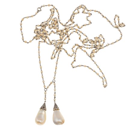 Sautoir con due perle naturali, acqua salata, di ct 18.56 e 21.05 con piccole...