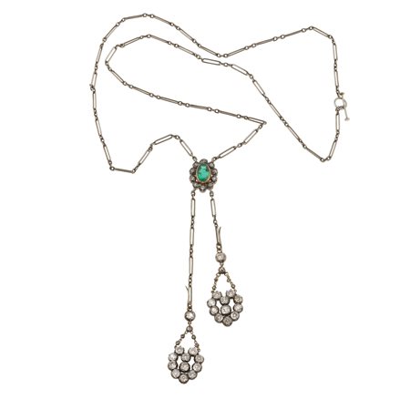 Collana negligèe con smeraldo centrale e diamanti montatura in platino, oro...