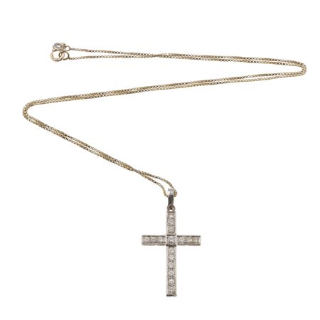 Pendente 'croce' con diamanti taglio brillante per ct 0.60 circa montatura in...