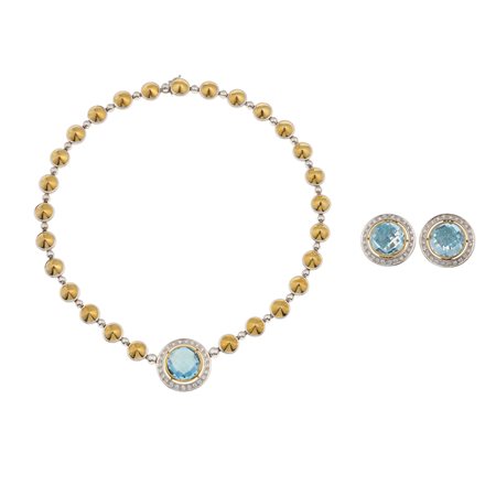 Demi-parure composta da girocollo ed orecchini con topazi azzurri e diamanti...