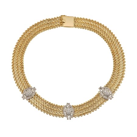 Girocollo con inserti in diamanti montatura in oro giallo ed oro bianco...