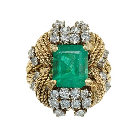 Anello con smeraldo Colombia e diamanti montatura in oro giallo 750/1000....