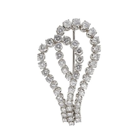 Spilla con diamanti taglio brillante montatura in oro bianco 750/1000, gr....