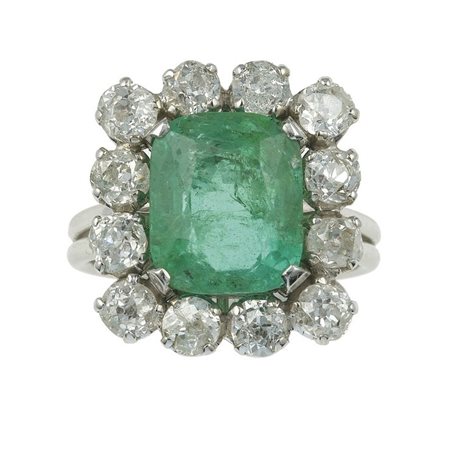 Anello con smeraldo Colombia di ct 5.80 circa e diamanti a contorno di ct...