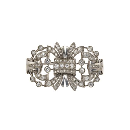 Spilla con diamanti di vecchio taglio montatura in oro bianco 750/1000. Un...