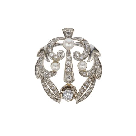 Spilla/pendente con diamanti e perle montatura in oro bianco 750/1000. Un...