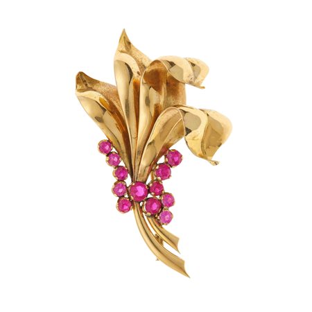 Spilla a soggetto floreale con rubini sintetici montatura in oro giallo...
