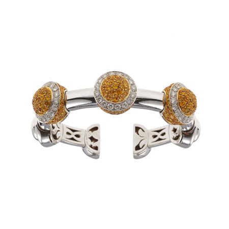 Chantecler. Bracciale rigido con diamanti e zaffiri gialli montatura in oro...