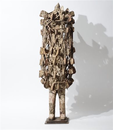 A large African Nkondi with iron blades