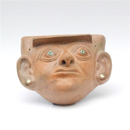 A fine terracotta mask