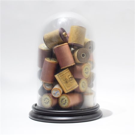 A composition with spools of thread