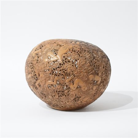 A fine Indonesian carved coconut shell