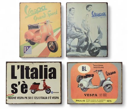 Four Vespa advertising signs