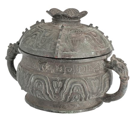 Cina
Vaso funerario in stile Zhou