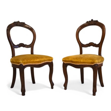 Sei sedie in mogano intagliato